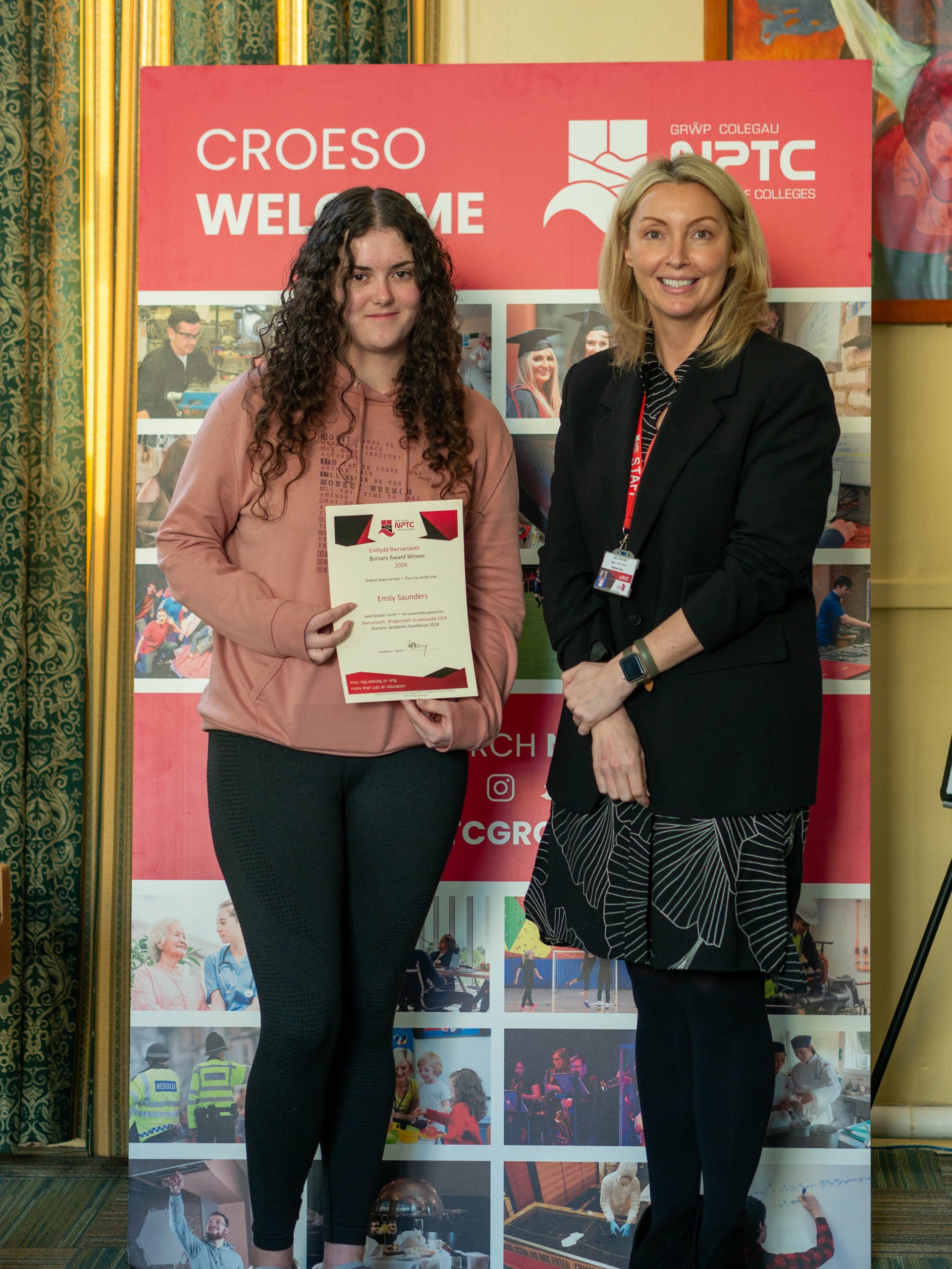 Bursary award winner with their certificate and Vice Principal: Tessa Jennings.