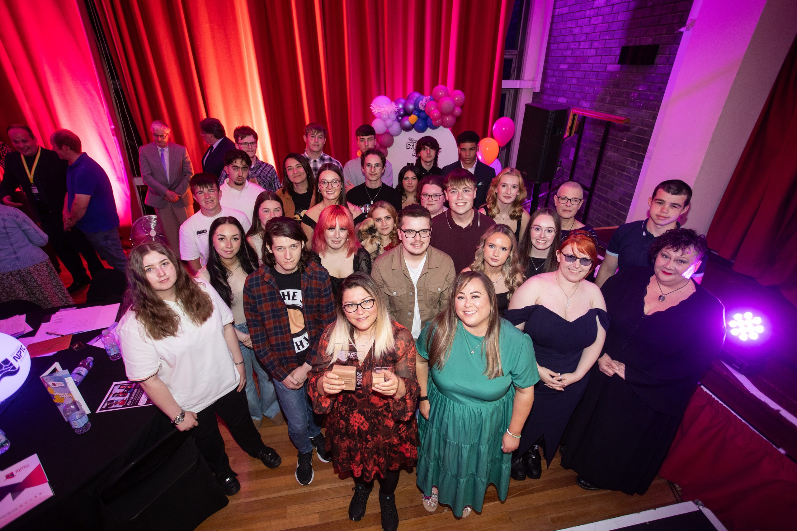 Group photo of all the Student Awards winners with their tropies.