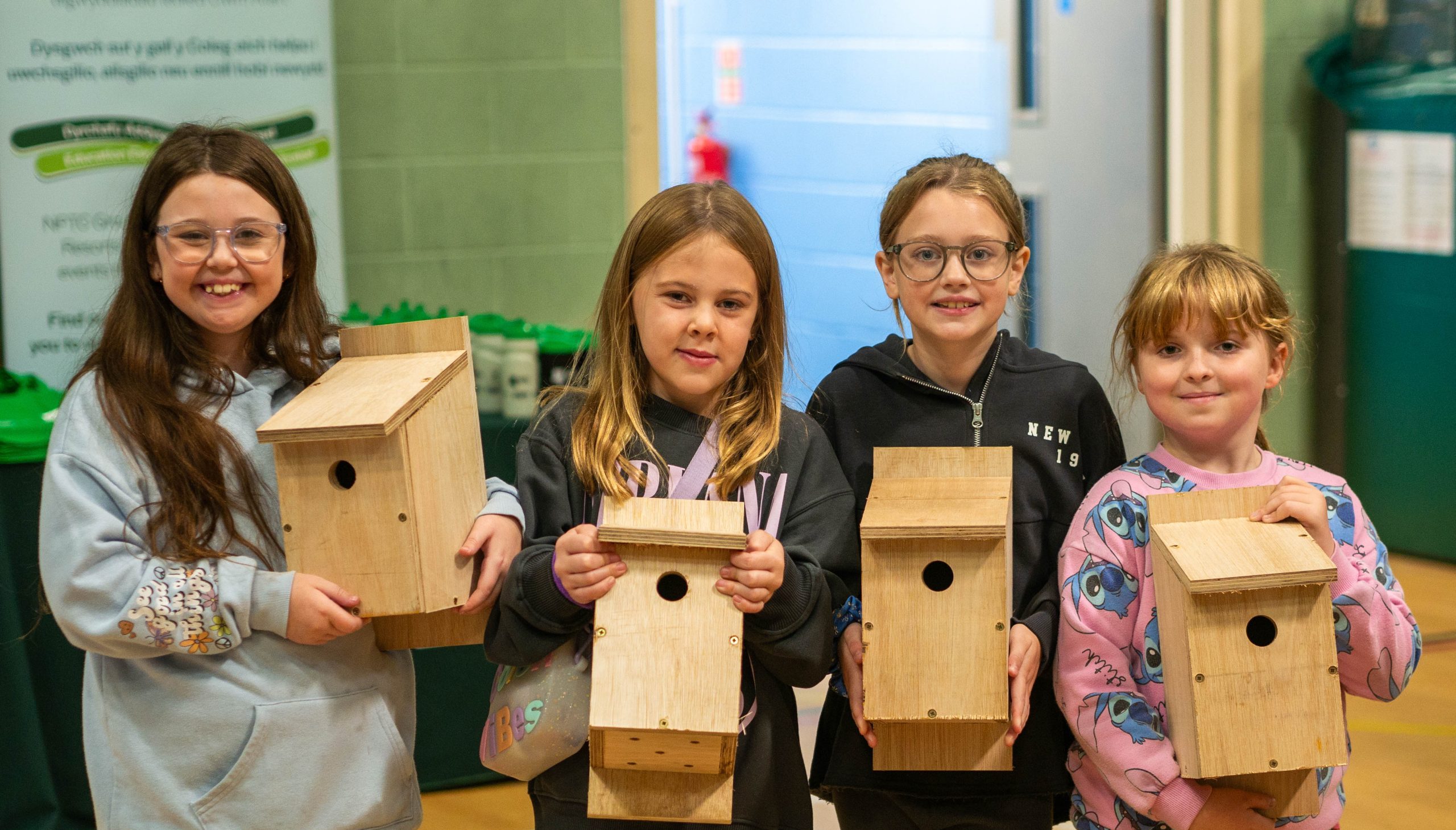 Afan Valley children with freshly made bird boxes at Cymmer Sport Centre